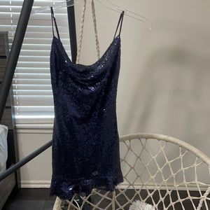 A Mini “Lucy in the sky” dress. It’s never been worn and is a size small